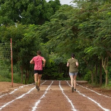 A Couple jogging on a track near Lake Manyara Serena Lodge