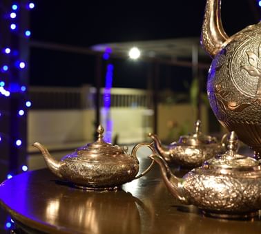 Brass teapots in Nazara Restaurant at Peshawar Serena Hotel