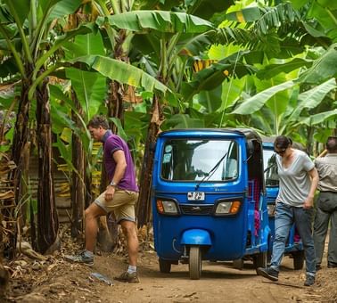 People on a Tuk Tuk village ride near Lake Manyara Serena Lodge